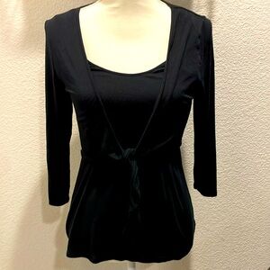 Raisey Black tank w/crop tie jacket attached.Fabric is rayon spandex. Nice fit!